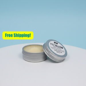 T's Tallow beef tallow lip balm in a metal container open
